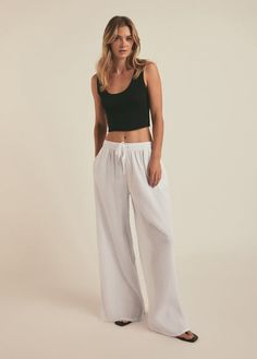 THE SLIP IT ON PANT White Breezy Loungewear Bottoms, Breezy White Loungewear Bottoms, Effortless Summer Loungewear Pants, Spring Wide Leg Parachute Pants, Spring Wide Leg Relaxed Parachute Pants, Relaxed Wide Leg Parachute Pants For Spring, Beach Season Wide Leg Harem Pants With Elastic Waistband, Comfortable Wide Leg Pants For Summer Lounging, Wide Leg Harem Pants With Elastic Waistband For Beach