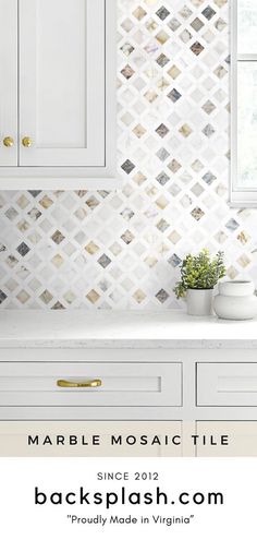 marble mosaic tile backsplash in white kitchen