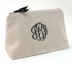 "Our linen monogrammed cosmetic bag is personalized with our most popular 3 letter monogram style - \"interlocking script\". Generous in size for all your cosmetic needs, it comes with a water repellent lining for easy clean up if something spills (don't you hate that?). The zip top closure top has a satin ribbon pull for easy opening. This makeup bag makes the perfect Personalized Bridesmaid Gift and Monogrammed Gift for Her. We offer 2 sizes - our larger size cosmetic bag measures 9\"w x 3\"d Customizable Everyday Rectangular Cosmetic Bag, Customizable Rectangular Cosmetic Bag, Rectangular Monogram Bag For Personal Use, Personalized Rectangular Bag With Zipper Pouch, Monogrammed Makeup Bags, Monogram Cosmetic Bag, Bags Inspiration, Personalized Makeup Bag, 3 Letter Monogram