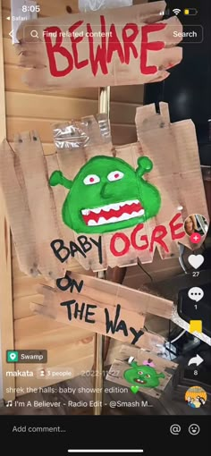 an image of a sign that says beware baby oggie on the way with cartoon characters