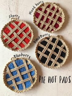 four crocheted coasters with different patterns on them