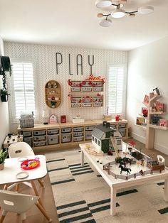 a play room filled with toys and furniture