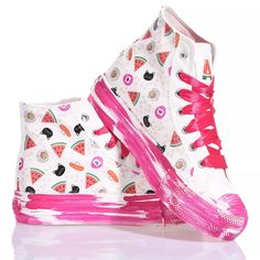 Bring joy with every step in the Mimanera sneakers inspired by the iconic Converse model in collaboration with Alyssa from Silvia & Kids. The unique and playful design features a sweet and delicate pattern on the sides and a fuchsia brushstroke effect platform sole, for a lively and feminine touch. Fuchsia satin laces add a hint of elegance and sophistication to the look. But the real standout feature of these sneakers is the customization option. You can add the initial of your name in the Trendy Multicolor High-top Sneakers With Vulcanized Sole, Trendy Flat Sneakers With White Sole, Trendy White Canvas Shoes With Rubber Sole, Cute High-top Summer Sneakers, Cute White Sneakers With Vulcanized Sole, Cute High-top Sneakers For Summer, Trendy Multicolor High-top Sneakers With Laces, Trendy Pink Canvas Shoes With Vulcanized Sole, Trendy Sneakers With Speckled Midsole