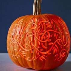 a carved pumpkin sitting on top of a table