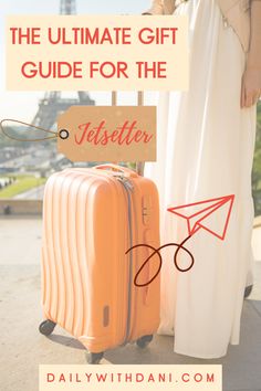 the ultimate gift guide for the jester from dailywithsani com, with an orange suitcase