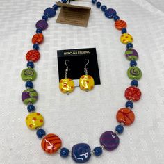 Kazuri Kenya Hand Crafted "Summer Days" Fair Trade Beaded 24" Statement Necklace & Earrings Set Nwt Multi-Strand Big Bold Statement Beaded Necklace Features An Assortment Of One -Of-A-Kind Beads Kenya, Magic Land Of Hot Colors, Fiery Sunsets, Ocean Blues, Sandy Plains, Pounding Hooves, And Spotted Shadows. This Is The Home Of The Original Small And Beautiful Kazuri Beads, And Pottery Hand-Made From Earthen Clay. Fired And Hand Painted By Kenyan Women, They Reflect The True Beauty Of Africa. Kazu Kazuri Bead Jewelry, Sunsets Ocean, Kenyan Women, Beauty Of Africa, Kazuri Beads, Hot Colors, Magic Land, Chunky Statement Necklace, Filigree Necklaces