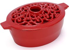 a red cast iron casserole on a white background