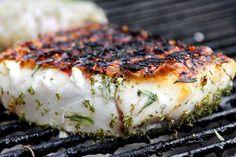 grilled or bhuna fish steaks recipe on the grill with caption