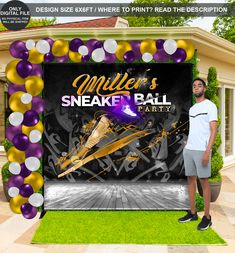 a man is standing in front of a backdrop for a sneaker ball party with balloons