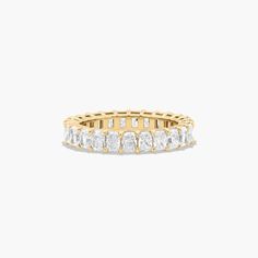 14K Yellow Gold Radiant Cut Diamond Eternity Ring (3 CTW H-I / SI1-SI2). This timeless eternity ring features the boldness and intense sparkle of radiant cut diamonds. A classic, tailored shared prongs setting allows the maximum amount of the diamonds surface to show. Number of diamonds and carat total weight will vary depending on ring size. Luxury Heirloom Eternity Band With Diamond Cut, Luxury Yellow Gold Eternity Band For Wedding, Luxury Heirloom Eternity Band For Engagement, Luxury Yellow Gold Half Eternity Wedding And Engagement, Luxury Yellow Gold Eternity Band For Formal Occasions, Luxury Gold Eternity Band For Formal Occasions, Luxury Heirloom Style Eternity Band As Promise Ring, Luxury Heirloom Diamond Cut Eternity Band, Luxury Classic Yellow Gold Eternity Band