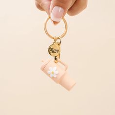 This Tiny Tumbler Keychain is an easy way to brighten up your essentials. Crafted from lightweight material, it features a gold detail keychain and flower detail on the front. Available in 6 attractive colors (Navy, Sandstone, Aqua, Pink, Oat, and Green), it's sure to be the perfect complement to any bag or wristlet. Features: Lightweight material Gold detail keychain Flower detail on front of tumbler Keychain Product Photography, Keychain Photography Ideas, Girly Keychains, Key Chains Aesthetic, Keychain Photography, Saving Account, Silicone Keychain, Keychain Ideas, Car Organization