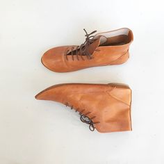 "These women's laced ankle boots are so cute and stylish! ► Made to order low heel booties, I will be delighted to personally handcraft a pair especially for you! ► Upper in buttery in Tan Soft Italian Leather ► See them in light taupe here: https://www.etsy.com/listing/150818369/women-ankle-boots-women-lace-up-leather ► Available in so many colors, see them all on picture 9 and let me know your favorite one! ► Leather insole for natural transpiration ► Padded ultra soft cushion to ensure the mo Casual Handmade Leather Boots, Handmade Casual Leather Boots, Handmade Brown Boots With Round Toe, Handmade Leather Casual Boots, Handmade Casual Booties With Round Toe, Handmade Casual Boots With Round Toe, Brown Lace-up Booties With Rubber Sole, Handmade Brown Ankle Boots, Handmade Brown Closed Toe Boots