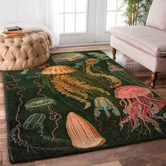 an area rug with jellyfishs and other sea creatures on it in a living room