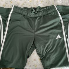 Cute Sage Green Adidas Track Pants/Joggers, Women’s Size Small. Perfect Condition, Never Worn! Green Sporty Sweatpants For Sports, Sporty Green Sweatpants For Sports, Green Adidas Sporty Activewear, Adidas Green Sportswear Activewear, Adidas Joggers For Sports, Sporty Green Jogging Pants, Green Moisture-wicking Pants For Jogging, Green Athleisure Bottoms With Side Stripes, Green Moisture-wicking Jogging Pants