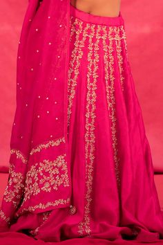 Pink lehenga in floral jaal embroidery in aari and moti work. Paired with an embroidered blouse and dupatta.
Components:3
Pattern:Embroidered
Type of Work:Thread work, Bead work, Aari
Neckline:V neck
Sleeve Length:Cap sleeves
Fabric:Organza, Silk
Color:Pink
Other Details:
Embroidered dupatta
Occasion:Wedding, Reception - Aza Fashions Silk Lehenga With Intricate Embroidery, Festive Silk Lehenga With Intricate Embroidery, Elegant Banarasi Silk Lehenga With Dori Work, Intricate Embroidery Raw Silk Lehenga, Jaal Embroidery, Moti Work, Pink Thread, Pink Lehenga, Types Of Work