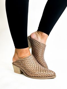 Introducing Corky's Bronze TGIF Mules, the perfect blend of style and comfort. Slide into these mules with ease and add a touch of sophistication to any outfit. With intricate weave detailing, these mules are sure to elevate your look. Wide foot and ankle friendly! Half sizes size up to the next full size These have the corkys signature cushion foam 2 inch heel! 2 Inch Heels, Elevate Your Look, Spring Shoes, Tgif, Mules Shoes, Mule, The Next, Boutique, Boots