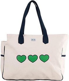 a white bag with green hearts on the front and blue trimmings, sitting in front of a white background