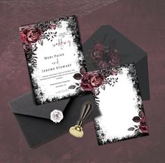 wedding stationery with roses and black envelope