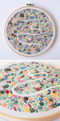 an embroidery project with flowers and leaves on the front, and in the back there is a