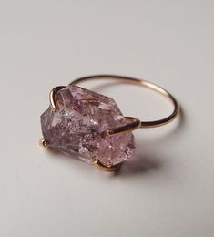 Featuring a stunning natural Vera Cruz Amethyst Herkimer stone in beautiful quality. The gemstone was hand crafted into a 14k gold filled bezel set ring. The stone measures approx. 10mm long I made this ring in size 6. It can be made larger upon request. This piece is a limited edition. Please note, each of these stones can differ in color & shape from the original picture piece. My QUALITY: Gold filled pieces contain 100+ times more real gold than gold plated pieces. Gold filled pieces are Amethyst Crystal Ring, Gold Crystal Ring, Raw Amethyst Necklace, Capsule Jewelry, Raw Amethyst Ring, Raw Amethyst Crystal, Crystal Engagement Rings, Rock Rings, Raw Crystal Ring