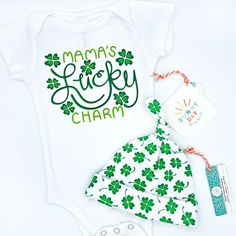 Do you feel like you won the baby lottery? Well then you'll love our "Lucky Charm" baby onesie, which is made in the USA from 100% organic cotton! Featuring a lapped neckline and 3 metal snaps for easy on/off diaper changes, this design makes an especially adorable baby shower gift for parents or Irish descent, babies born in March, or those who love celebrating St. Patrick's Day! Available in sizes 0-3M, 3-6M, 6-12M, and 12-18M. Shades of green and White. Vinyl heat transfer print. Each baby on Cotton Onesie Gift For Spring, Playful Cotton Bodysuit As A Gift, Newborn Baby Gift Set, Born In March, Irish Baby, Clover Design, Newborn Baby Hats, Feeling Lucky, Newborn Hat