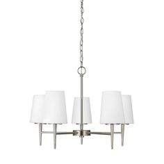 three light chandelier with white shades on the bottom and two lamps hanging from each side