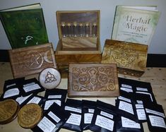 several wooden boxes with cards and magnets on them