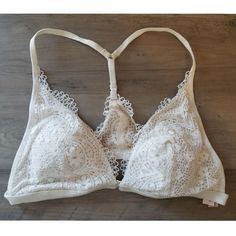 Victoria's Secret Bralette. New Without Tags. White Lace Bralette With Front Clasp And Removable Pads. Size Medium. Spring Lace Beige Bra, Spring Beige Lace Bra, Summer Lace Bra In Cream Color, Cream Lace Bra For Summer, Summer Cream Lace Bra, Victoria's Secret Spring Bra With Lace Trim, Victoria's Secret Beige Bra For Spring, Spring Beige Bra From Victoria's Secret, Spring Victoria's Secret Beige Bra