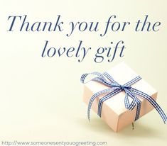 a thank you for the lovely gift card with a present wrapped in blue and white ribbon