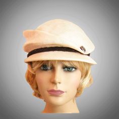 This charming ladies newsboy cap is hand draped on an antique wooden head form.  My hats have an inside adjustable ribbon for fine-tuning the fit,  please indicate your head size measurement when ordering. Comes with a hat box for safe storage. I personally create each hat one at a time, and no two are ever exactly the same.  My hats are 100% handmade using traditional Millinery techniques and the highest quality fabrics and details. Because of this, please allow 2-3 weeks before shipping, unless otherwise agreed upon. Vintage Beige Visor Hat, Chic Beige Cloche Straw Hat, Chic Beige Straw Cloche Hat, Fitted Beige Cloche Straw Hat, Fitted Beige Brimmed Cloche Hat, Brimmed Beige Straw Cloche Hat, Beige Brimmed Straw Cloche Hat, Elegant Beige Straw Cloche Hat, Elegant Beige Straw Hat