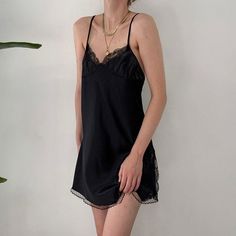 Mini Length Lace Trim Slip Dress For Night Out, Lace Trim Mini Slip Dress For Night Out, Mini Slip Dress With Lace Trim For Night Out, Chic Night Mini Dress With Lace Trim, Chic Mini Dress With Lace Trim For Night, Elegant Black Camisole Dress, Flirty Camisole Mini Dress, Night Mini Dress With Lace Trim, Mini Dress With Lace Trim For Night