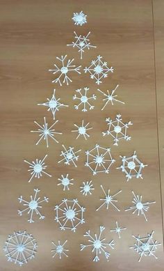 a christmas tree made out of snow flakes