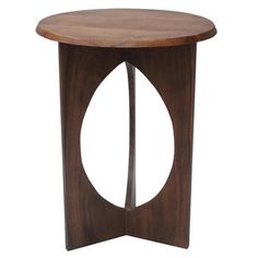 a wooden table with a circular design on the top and one section cut in half