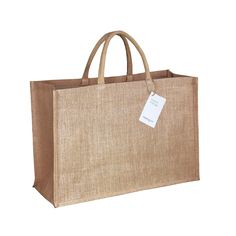 a brown shopping bag with a tag on it