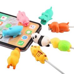 an iphone with four different animal plugs attached to it