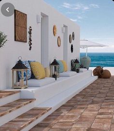 an artist's rendering of a patio with steps leading to the ocean