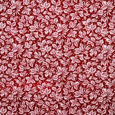 a red and white floral pattern on fabric