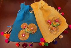 Decorative Indian Jute Potli Bag /Jute Beads /Handmade Jute Small Bag/Gift Pouch Bag/Coins Jute Bag/Cash Pouch/Birthday Gift Pouch / gift for her Material- Jute Decorative Jute Potli with Parrot & Golden Designs. Includes pom- poms & a cute tassel, which gives a boho- chic look. It also includes a cute little beaded strap to make it easy to carry around. Very lightweight made with high quality. Colors available- - Yellow - Blue Contact us for any questions ! Jute Potli Bags, Bohemian Beaded Potli Bag For Gifts, Bohemian Beaded Potli Bag As Gift, Multicolor Handwork Pouch For Gift, Bohemian Jute Bag As Gift, Traditional Jute Bags As Gifts, Handmade Multicolor Pouch Potli Bag, Handmade Multicolor Pouch For Crafting, Multicolor Handmade Potli Pouch Bag