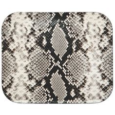 a white and black snake skin pattern on an area rug