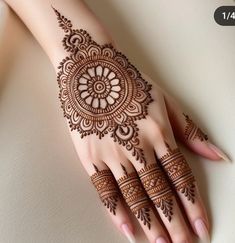 a henna tattoo is shown on someone's hand