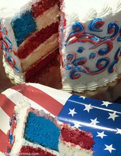 two cakes with red, white and blue frosting on them sitting next to each other