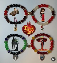 the book of life bracelets are decorated with charms