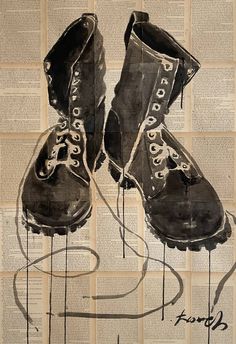 a pair of black shoes sitting on top of an old book page with writing underneath it