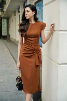 The dress brings elegance and high class to the wearer by design and color. Suitable for parties and formal events. Brown Dresses Formal, Mean Blvd, Corset Waist, Classy Work Outfits, Dresses For Teens, Brown Dress, High Class, Classy Dress