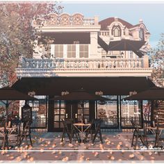 an outdoor cafe with tables and chairs in front of it, surrounded by autumn leaves