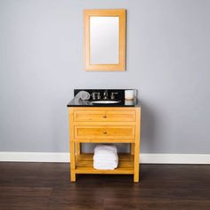 With its compact size, this eco-friendly bamboo vanity is the perfect fit for a tropical boho bathroom. #jungalow #boho #beachbathroom #vacationhome