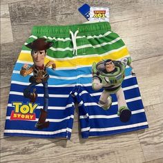 Toy Story Swim Suit Woody And Buzz From Toy Story Are Ready To Make Waves On This Cute Pair Of Swim Shorts For Boys. Quick Dry Upf 50+ Material For Uvb And Uva Protection Mesh-Lined Shorts; Functional Drawstring Closure Sizes - 7 Fast Shipping Smoke Free Home Any Questions, Please Contact Us! Reasonable Offers And Bundles Always Welcomed! Thanks For Visiting Our Closet! #Bathingsuit #Boysswimsuit #Boysswimtrunks #Poolday #Beachday #Toystory #Disney #Swimshorts #4t #Woody #Buzzlightyear Playful Character Print Bottoms For Playwear, Playful Multicolor Bottoms With Character Print, Fun Cartoon Print Bottoms For Playwear, Fun Multicolor Bottoms For School, Playful Blue Bottoms For School, Fun Blue Bottoms For Playwear, Playful Cartoon Print Bottoms For Playwear, Fun Multicolor Bottoms For Playtime, Fun Multicolor Bottoms With Cartoon Print