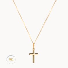 This 9k Gold Cross Necklace includes a beautifully delicate fine gold chain and a cross pendant crafted out of 9k solid gold. Pair with a personalized engraved necklace or simply wear it alone for a statement look.9K Fine GoldCross charm size: Length 12mm, Width 8 mm, Thickness: 0.8 mmSecure clasp fasteningCharms are removable from this chainHand engraved in our Paris workshopSent with love in a complimentary gift boxAny slight variations in lettering depth, spacing and alignment from the exampl 14k Yellow Gold Cross Pendant Charm Necklace, Yellow Gold Charm Necklace With Cross Pendant, Yellow Gold Cross Pendant Charm Necklace With Delicate Chain, Yellow Gold Cross Charm Necklace Tarnish Resistant, Dainty 14k Yellow Gold Cross Necklace, Yellow Gold Tarnish-resistant Cross Charm Necklace, Yellow Gold Cross Charm Necklace With Delicate Chain, Delicate Yellow Gold Cross Charm Necklace, Elegant Yellow Gold Cross Charm Necklaces