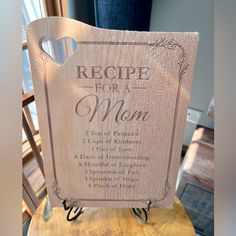 a wooden sign that says recipe for a mom