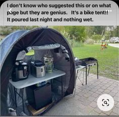 an outdoor kitchen is set up in a tent with the words, i don't know who suggest this or what page but they are geniuses it's a bike tent